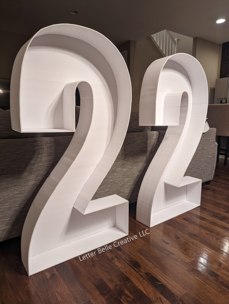 4-ft tall "22" mosaic numbers made of white foam core. Empty & unadorned

Letter Belle Creative