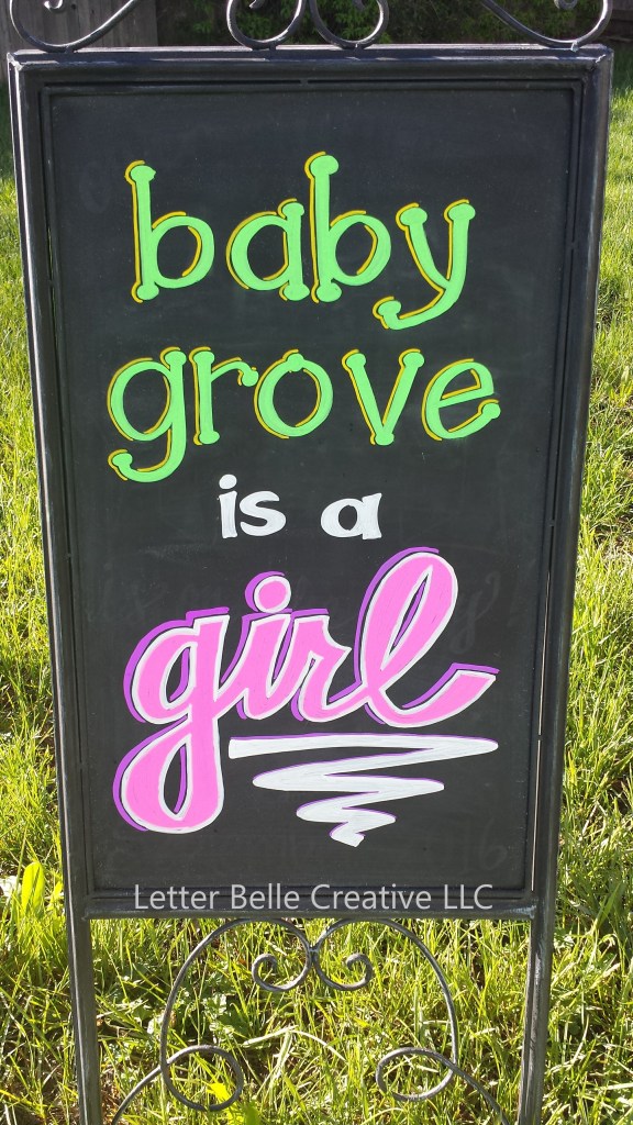 Black chalkboard announcing baby's gender. Colorful hand lettering: baby grove is a girl

Letter Belle Creative