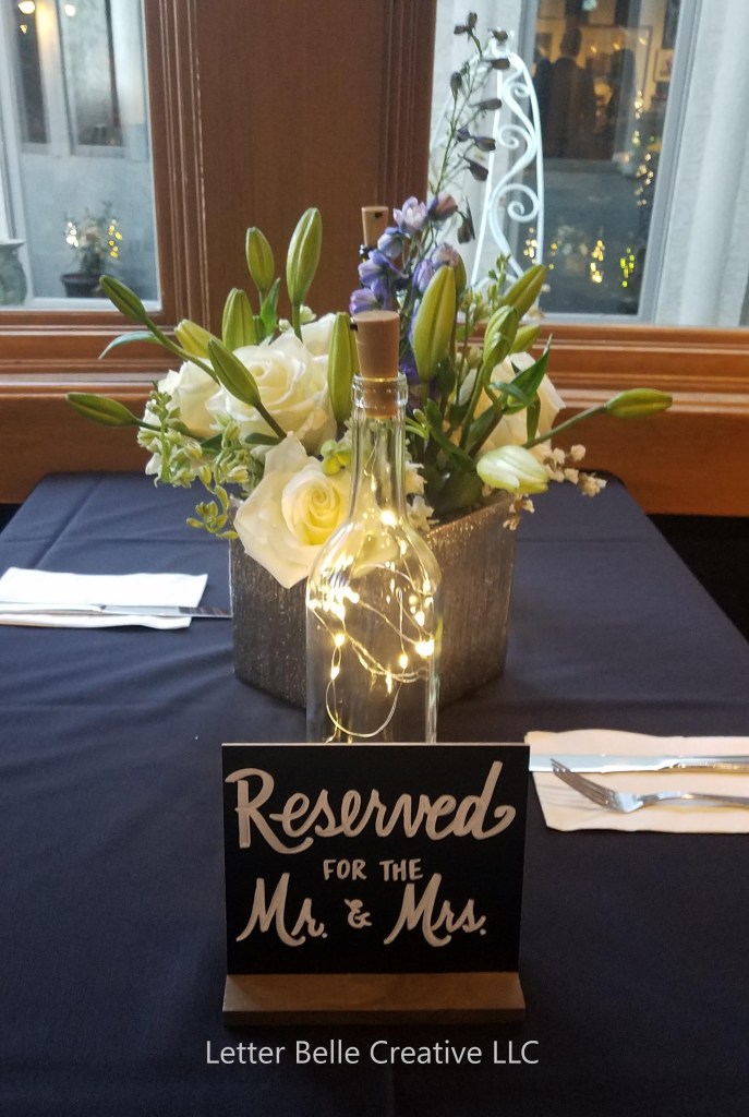Small chalkboard with white hand lettering: Reserved for the Mr. & Mrs.

Letter Belle Creative